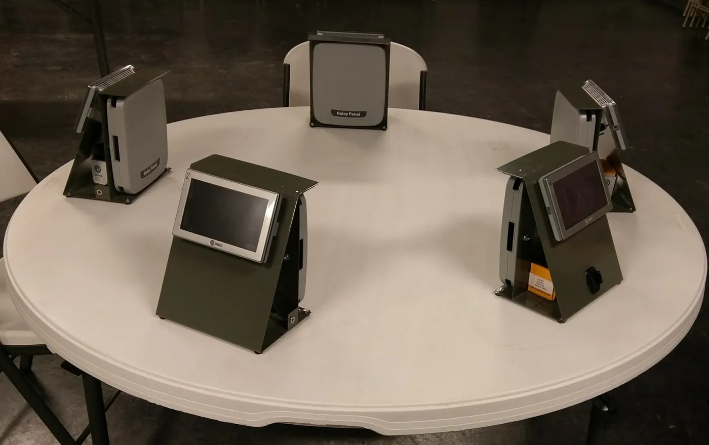 Research test stations set up around a round table
